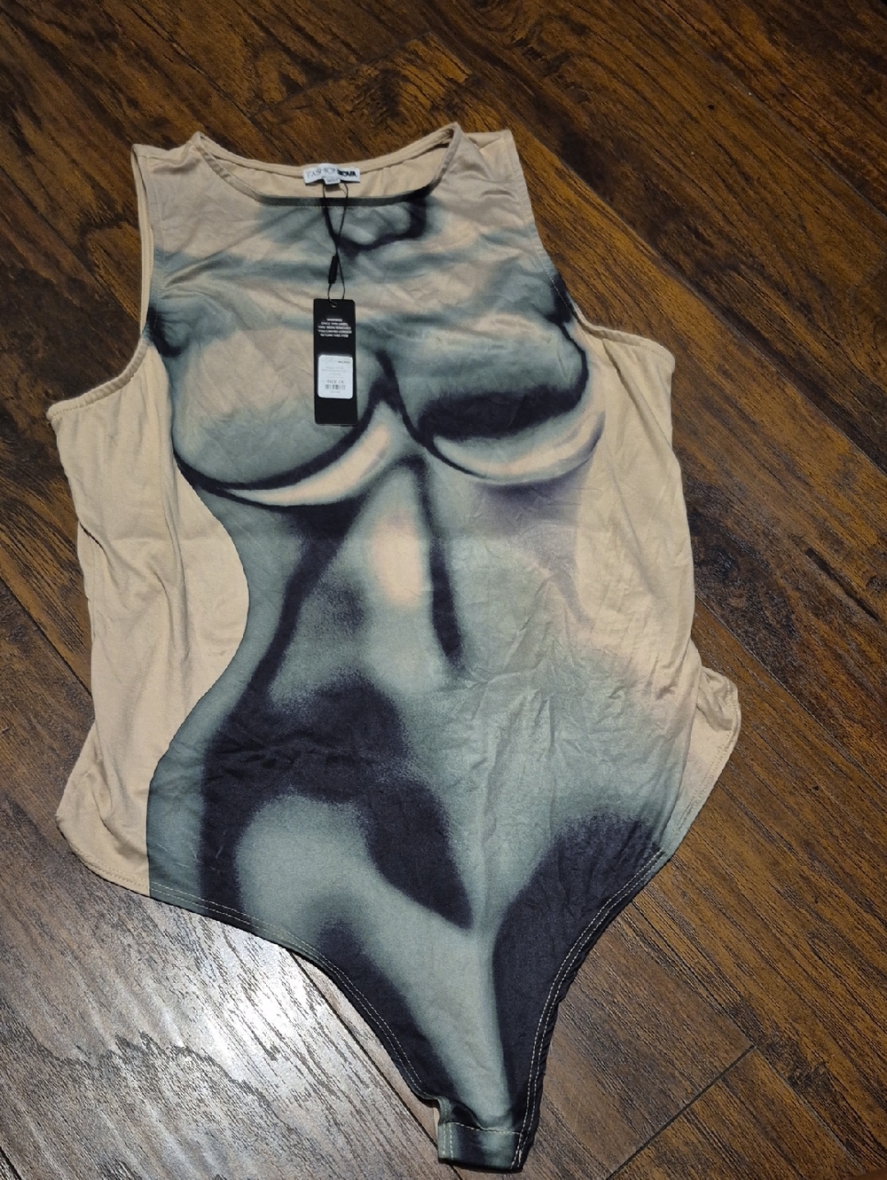 Sleeveless Graphic Bodysuit in Beige and Black - [Brand Unspecified]